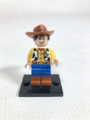 TOY025 Woody - Normal Legs, Minifigure Head, Smile with Teeth / Scared